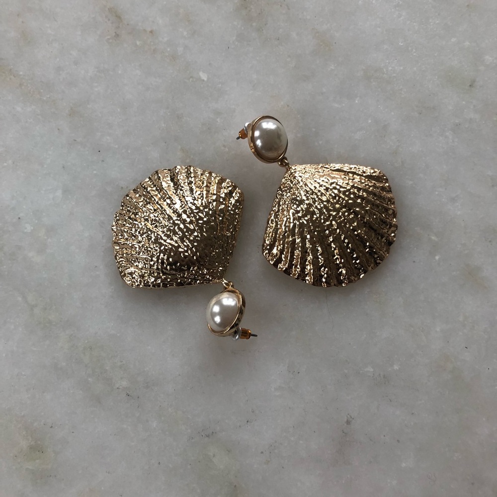 Gold seashell earrings with pearl stud